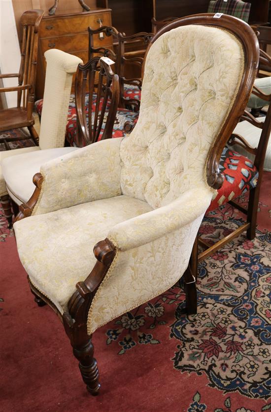 An early Victorian walnut show frame armchair
